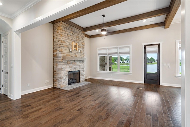 680 Magnolia Ln, Piperton, TN 38017 - unfurnished living room with dark wood-style flooring, a fireplace, beam ceiling, arched walkways, and recessed lighting