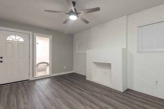 entrance foyer with dark hardwood / wood-style flooring and ceiling fan