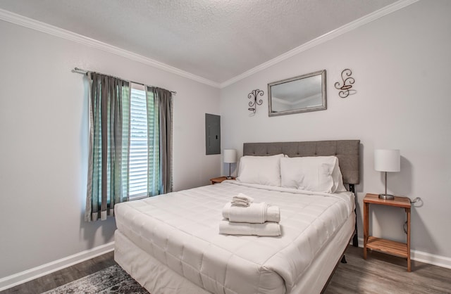 bedroom featuring ornamental molding, a textured ceiling, dark wood-type flooring, electric panel, and lofted ceiling