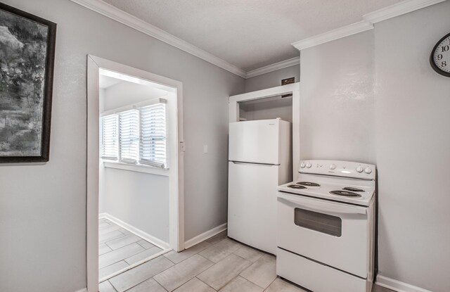 kitchen featuring white appliances and ornamental molding