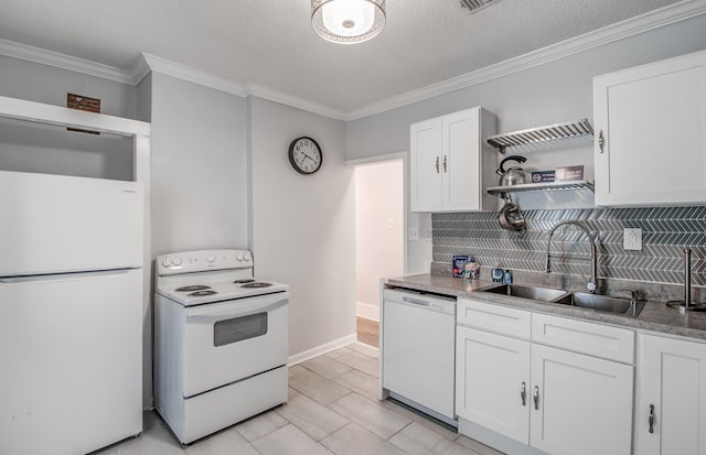 kitchen featuring tasteful backsplash, a textured ceiling, white appliances, sink, and white cabinetry