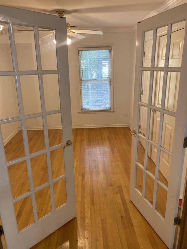 interior space featuring ceiling fan and hardwood / wood-style floors