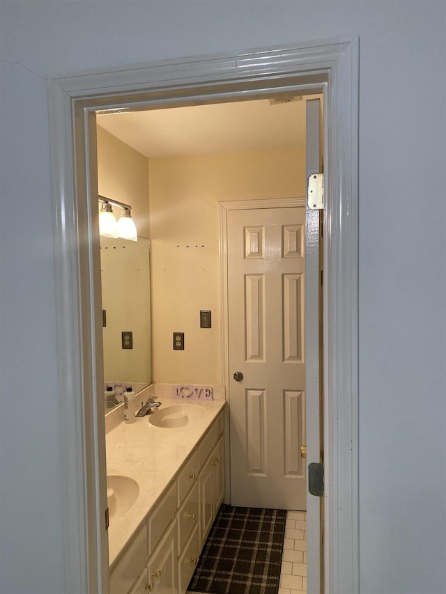 bathroom featuring tile patterned floors and vanity