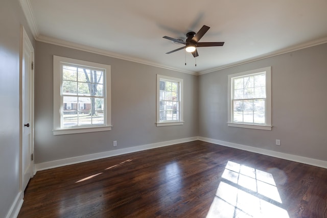 unfurnished room featuring plenty of natural light, dark hardwood / wood-style flooring, and crown molding