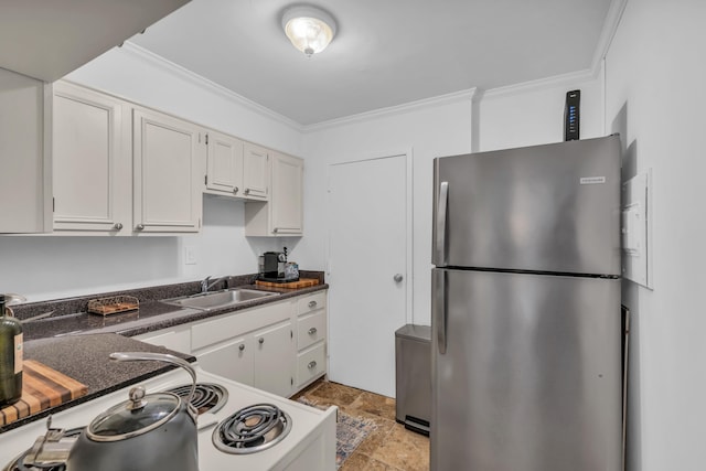 kitchen with white cabinetry, sink, crown molding, and appliances with stainless steel finishes