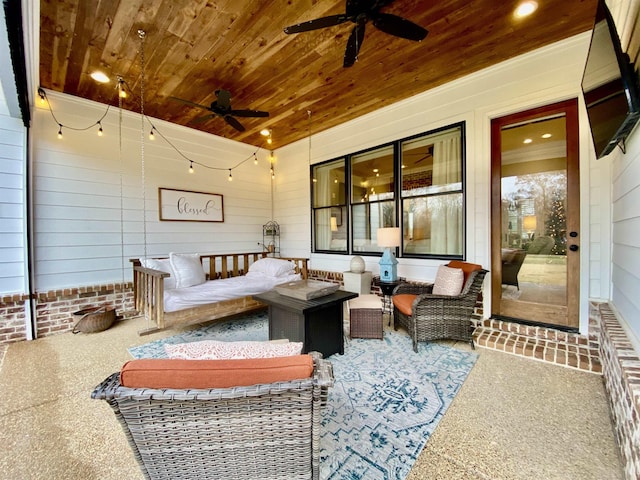 view of patio featuring an outdoor living space and ceiling fan