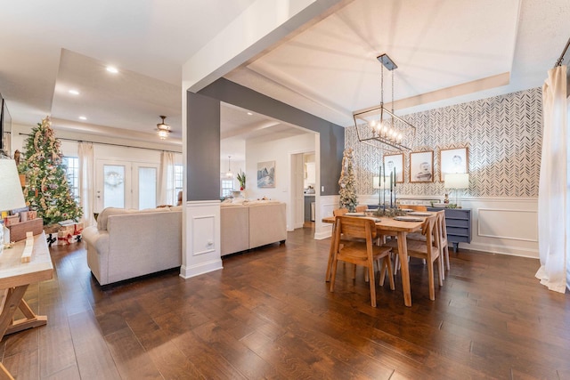 dining space with dark hardwood / wood-style flooring