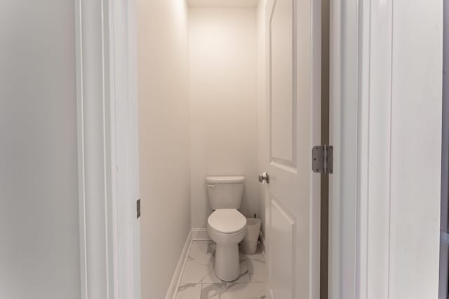 bathroom featuring toilet