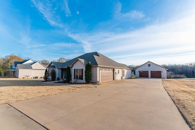 ranch-style home with a garage