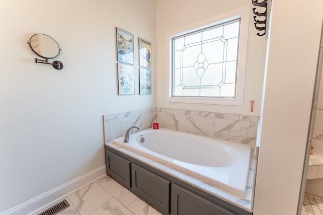 bathroom featuring a tub