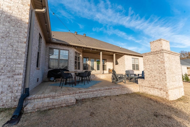 back of house with a patio area