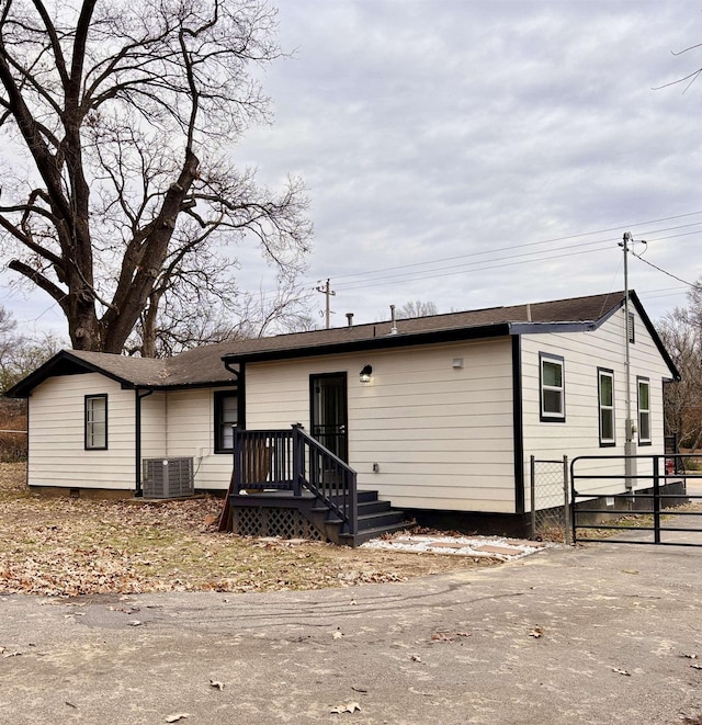 view of front of home with central AC unit