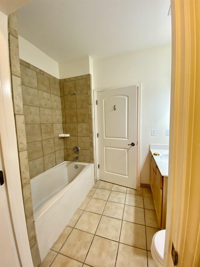 720 Litty Ct Unit 102, Memphis, TN 38103 - full bathroom with tile patterned flooring, vanity, tiled shower / bath combo, and toilet