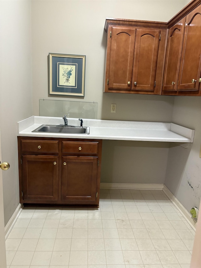 laundry room with sink