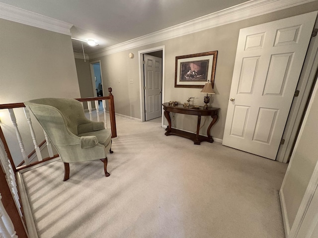 sitting room with light colored carpet and crown molding