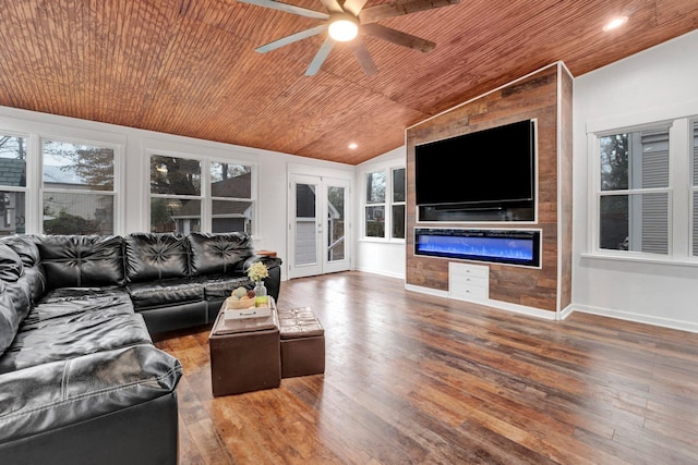 living room with hardwood / wood-style flooring, vaulted ceiling, ceiling fan, and wooden ceiling