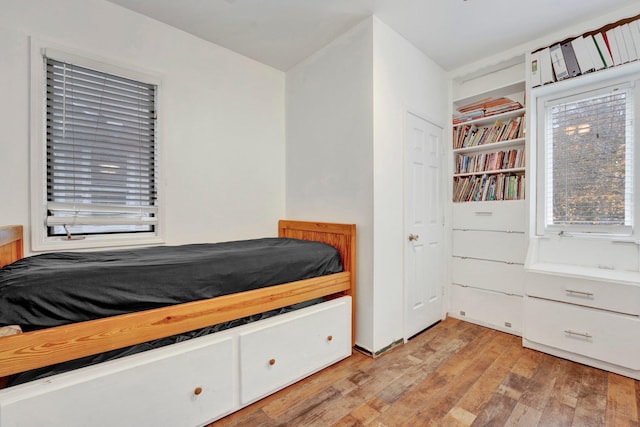 bedroom featuring light wood-type flooring