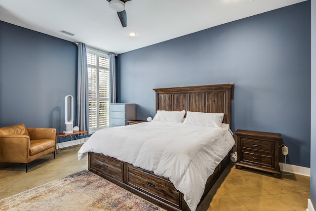 bedroom featuring light tile patterned floors and ceiling fan