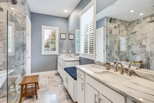 bathroom with vanity and a shower with shower door