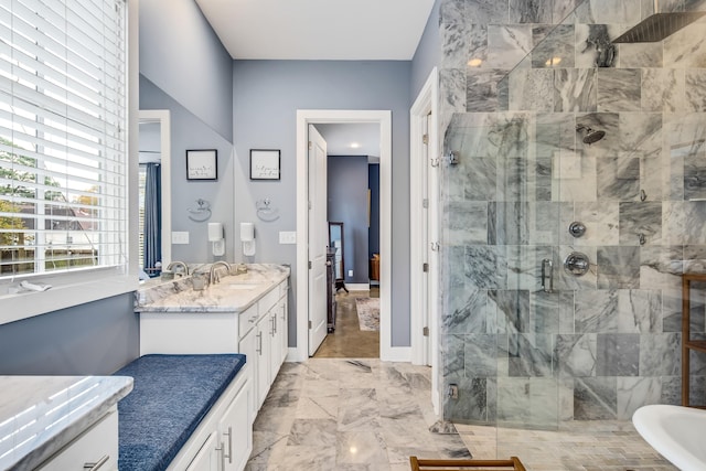 bathroom featuring vanity and shower with separate bathtub