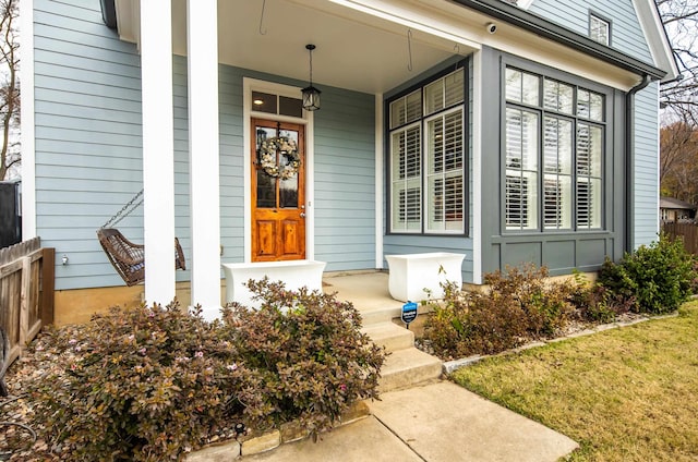 property entrance with a porch