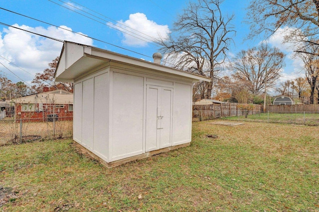 view of outdoor structure featuring a yard