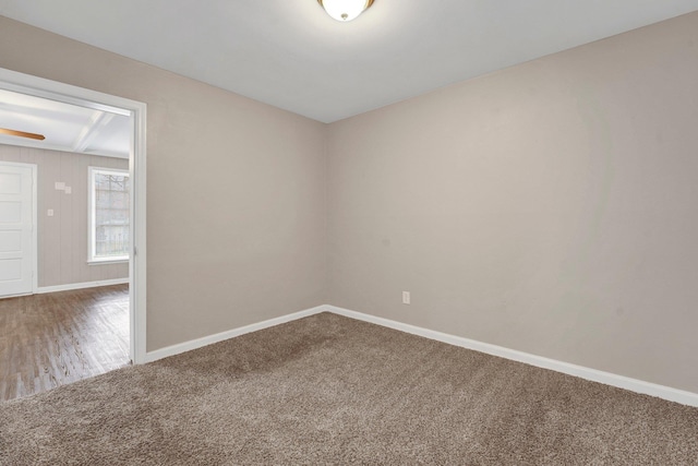 unfurnished room with hardwood / wood-style floors