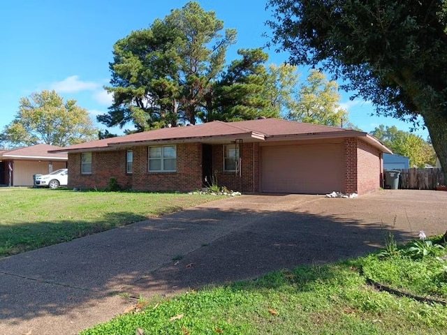 single story home with a garage and a front yard