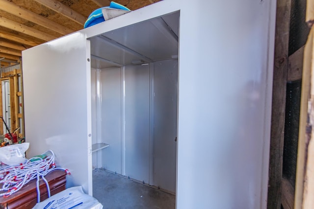 interior space featuring concrete flooring