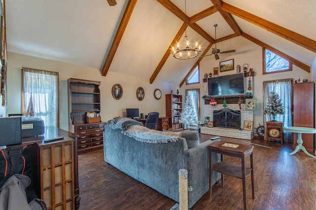 living room featuring a brick fireplace, beamed ceiling, high vaulted ceiling, dark hardwood / wood-style floors, and ceiling fan with notable chandelier