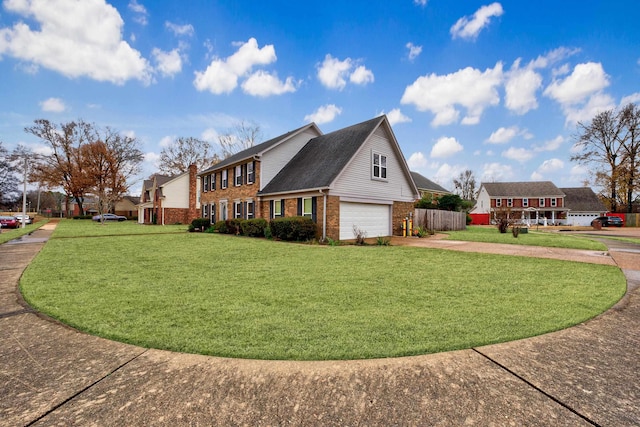 view of home's exterior featuring a garage and a yard