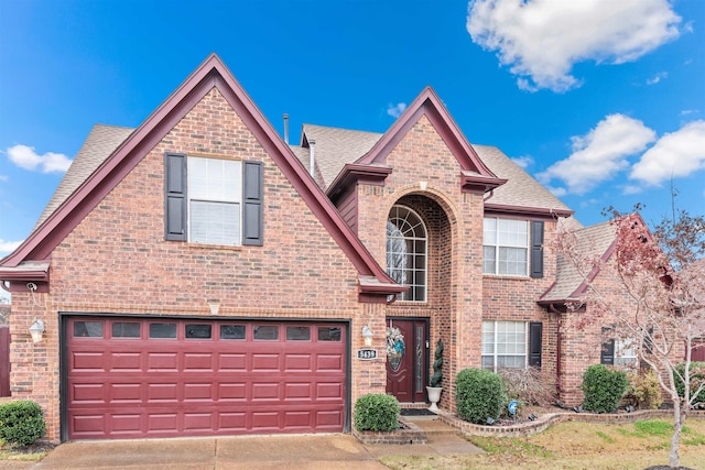 view of front of property with a garage