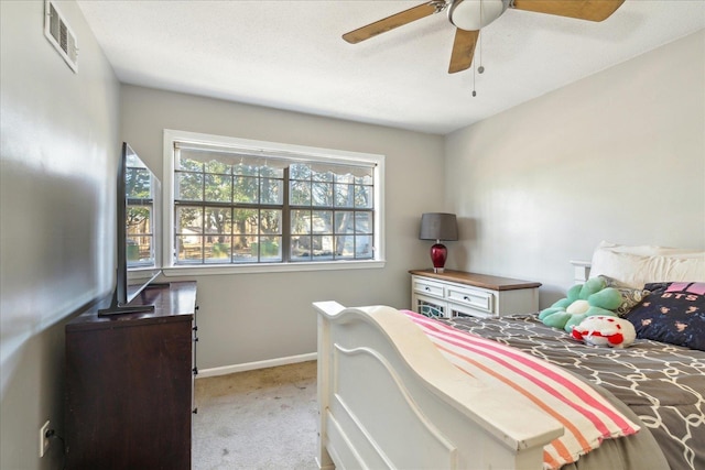 bedroom featuring ceiling fan and light colored carpet