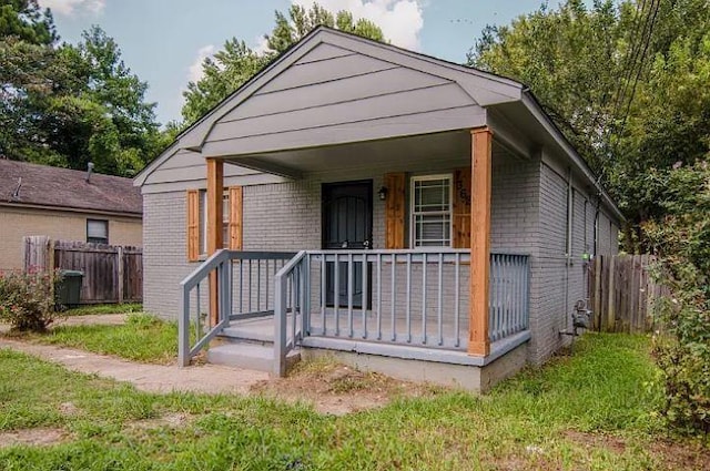 bungalow-style home with a porch