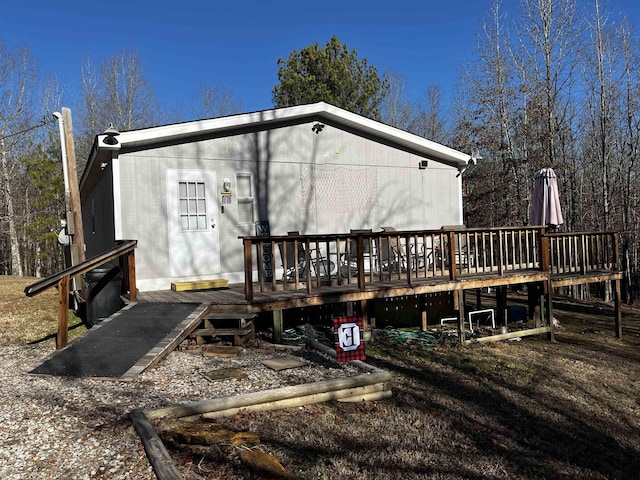 rear view of house with a deck