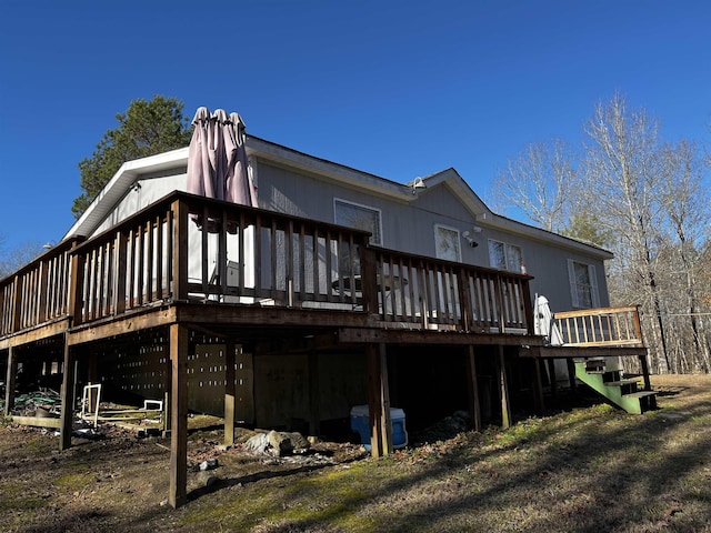 rear view of house with a deck