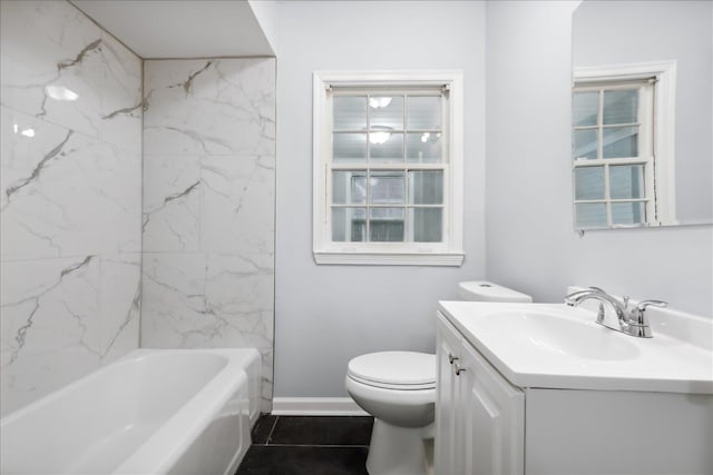 full bathroom with tile patterned floors, vanity, toilet, and tiled shower / bath combo