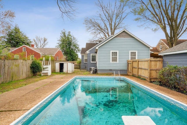 view of pool featuring a shed