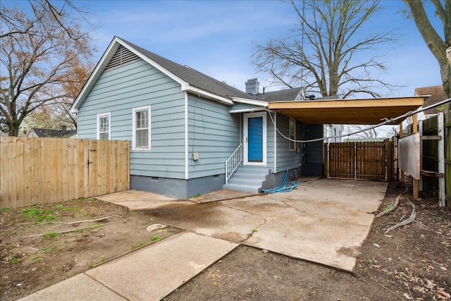 view of front of house featuring a carport