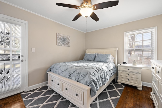 bedroom featuring ceiling fan, crown molding, and dark wood-type flooring