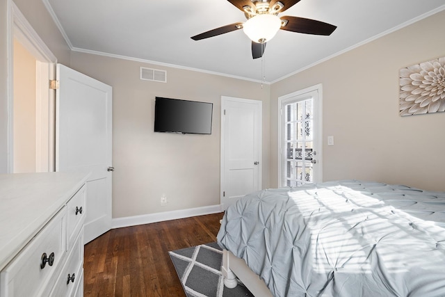 bedroom featuring ceiling fan, dark hardwood / wood-style flooring, and ornamental molding