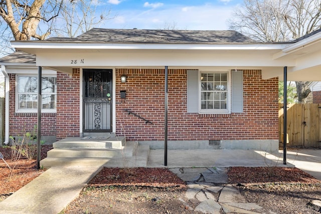 entrance to property with a porch