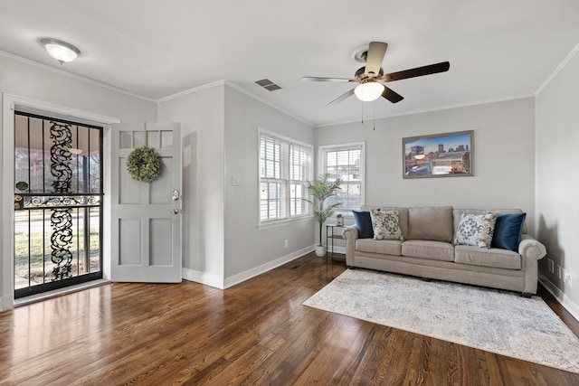 foyer entrance featuring ceiling fan, dark hardwood / wood-style flooring, and ornamental molding