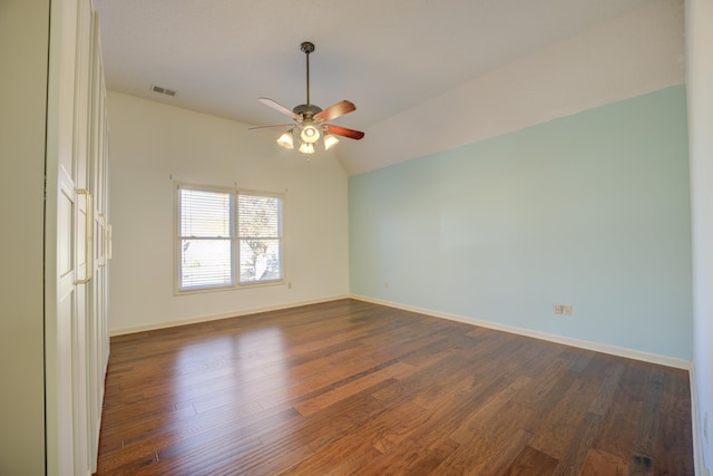 unfurnished room with dark hardwood / wood-style floors and ceiling fan