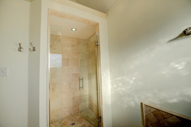 bathroom featuring an enclosed shower