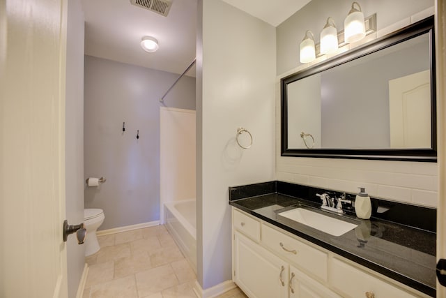 full bathroom with backsplash, vanity, shower / tub combination, and toilet