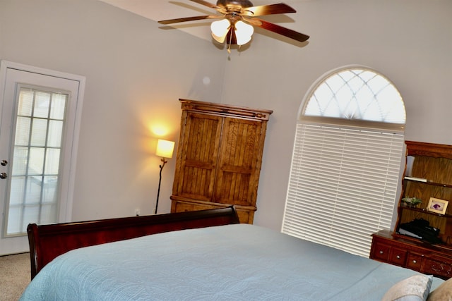 carpeted bedroom featuring ceiling fan