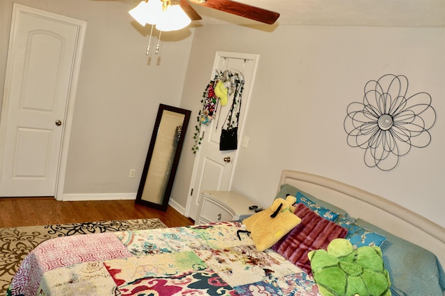 bedroom featuring hardwood / wood-style flooring and ceiling fan