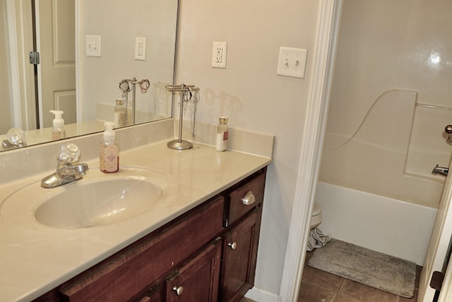 bathroom with vanity, tile patterned floors, and shower / bathtub combination