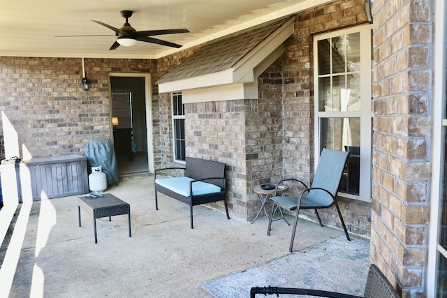 view of patio with ceiling fan